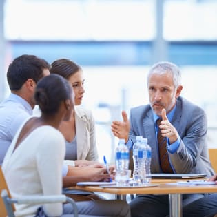 Government professionals discussing digital transformation